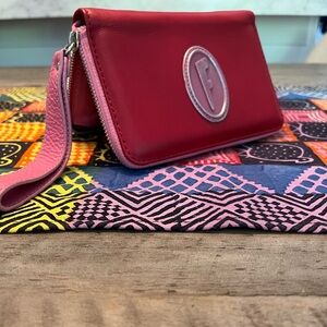 John Fluevog pink leather wristlet wallet brand new, multiple slots.